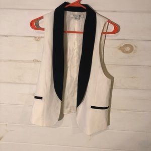 Back and white tuxedo vest